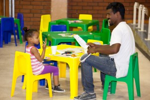 A father sits across from his daughter at Mosaic's "Father and Child Day."