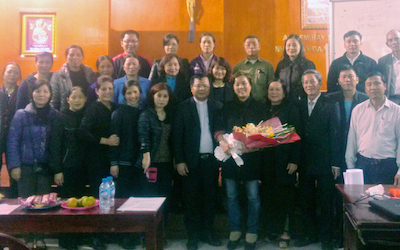 Religious leaders in Hanoi pose in a group photo after completing a training with CSAGA.