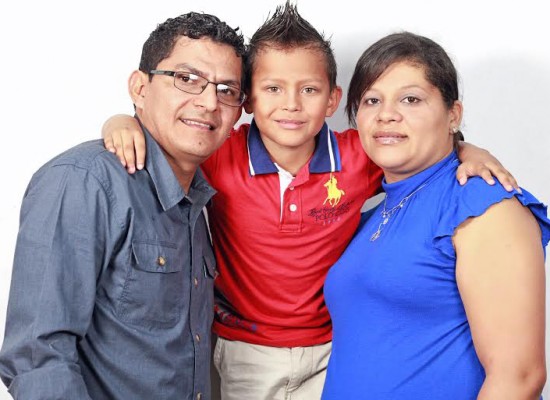 Interviewee Douglas Mendoza with his wife and son.