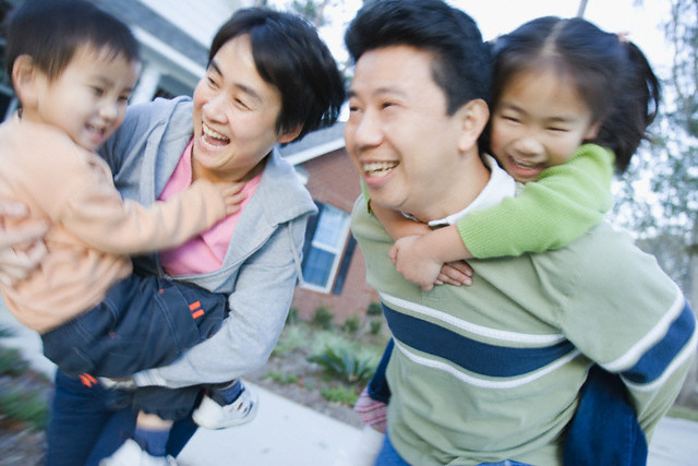 Fathers playing with children.