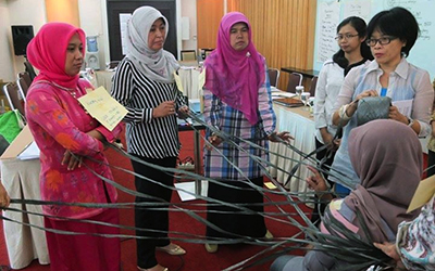 A group of health workers at a group training on male involvement in the health sector.