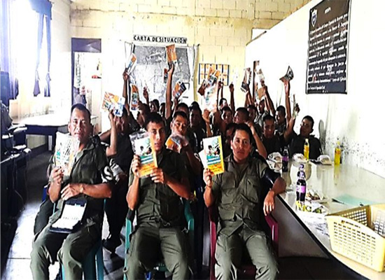 A group photo of fathers in the military detachment of the National Army in Guatemala at a MenCare workshop