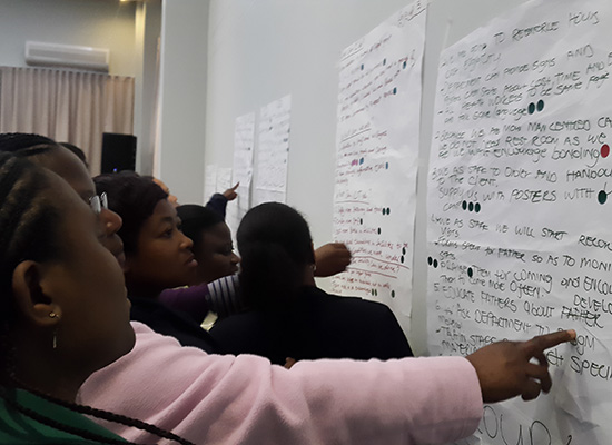 Health workers at a MenCare+ workshop on engaging men in maternal and child health in South Africa