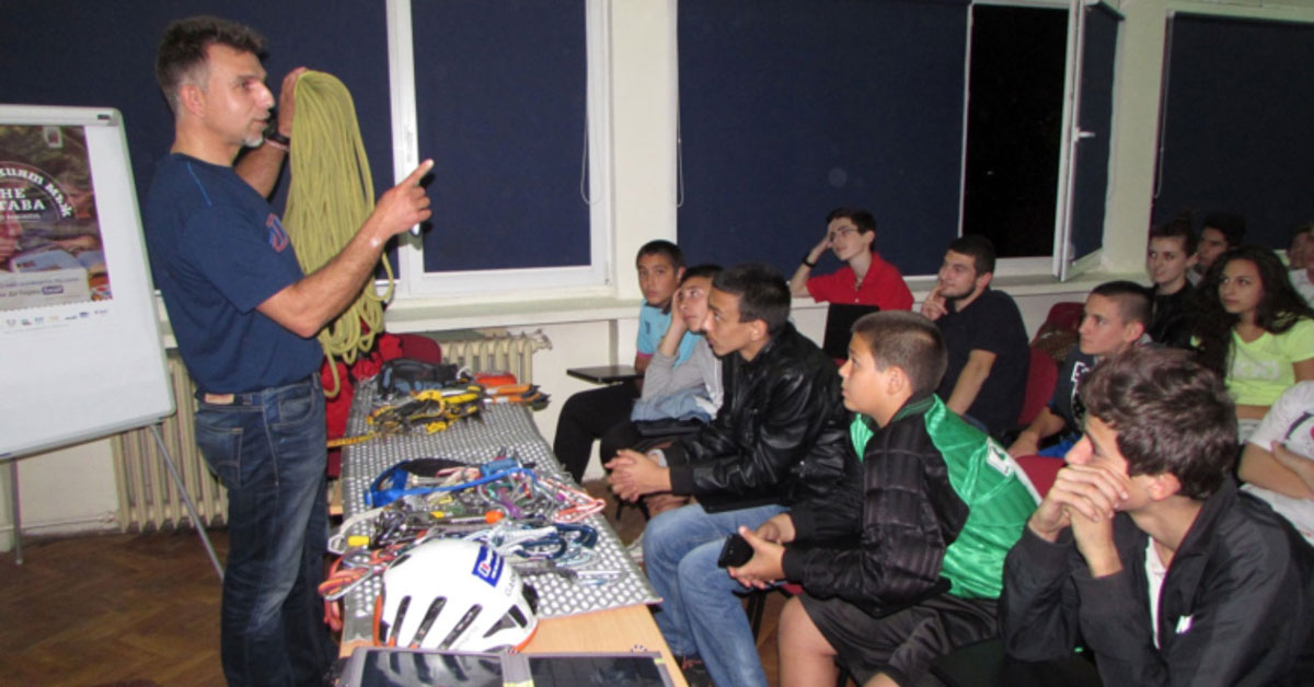 Boyan Petrov discusses climbing skills with students during Father's Week in Sofia, Bulgaria.