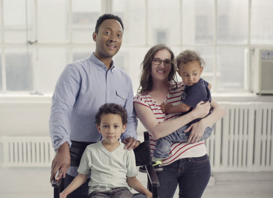 A family looks at the camera in a still from "America's Dads."