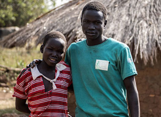 Grace Aciro with her family in Loigolo village in Alaa Parish, is located in the extreme north of Lamwo district in northern Uganda.