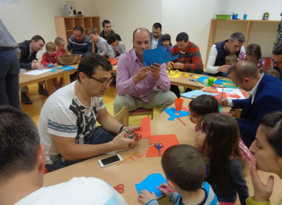 Fathers and children in kindergarten in Bulgaria.