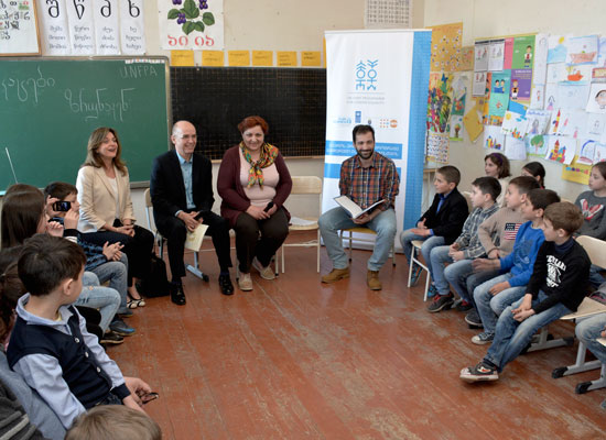 Mr. Kulessa and Mr. Lortkipanidze read books for children at Telavi Public School #1 in Georgia. Photo by Vladimer Valishvili.